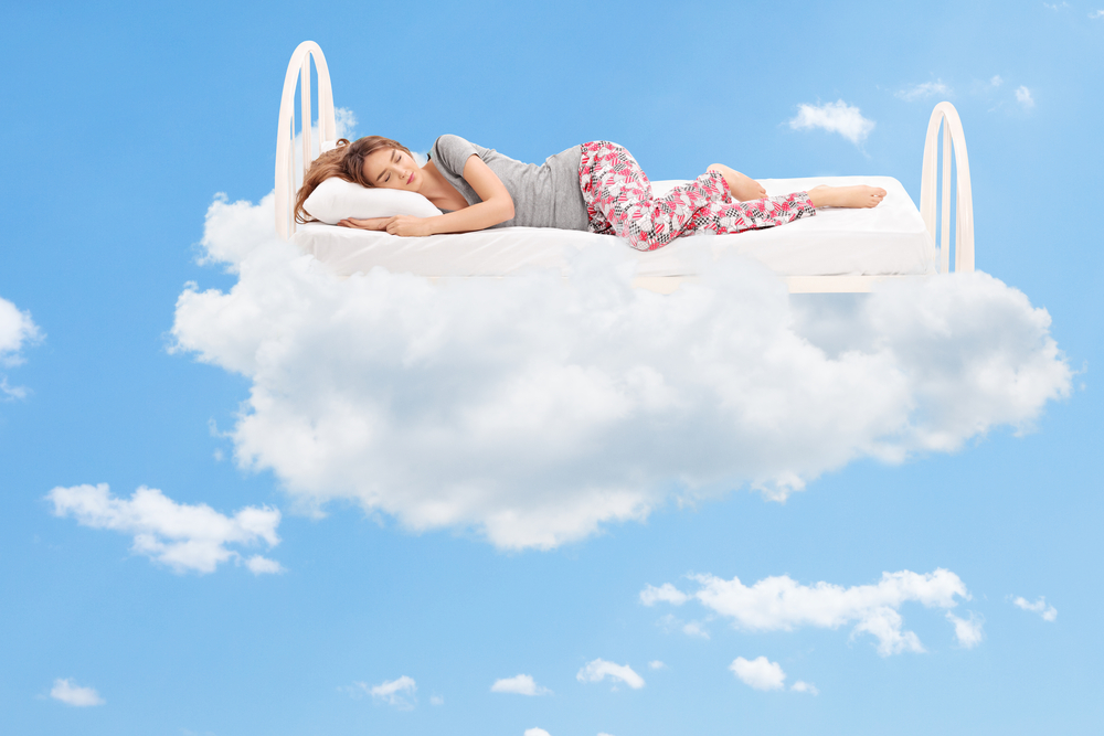 Lady asleep on clouds