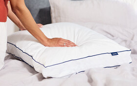 Emma Microfbre Pillow Lifestyle Hands