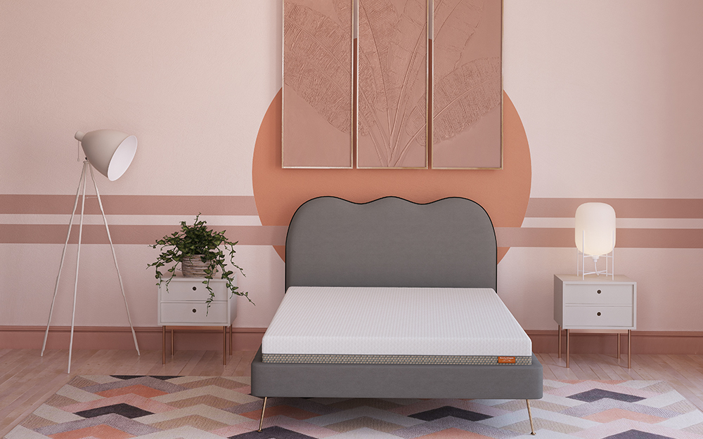 The Bodyshape Value Memory Mattress in a pale pink bedroom