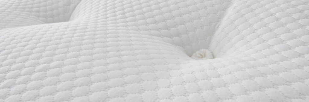 Close up of a mattress tuft