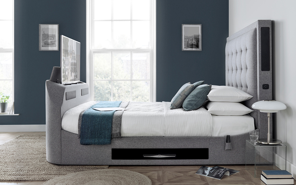 The Novo Contempo TV Bed in a grey bedroom.