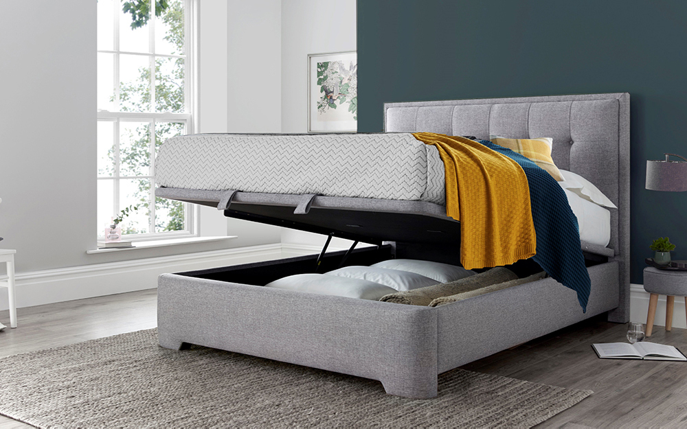 The Novo Falcini Ottoman Bed Frame in a blue bedroom