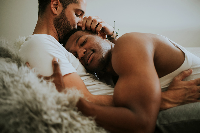 Men Cuddling in Bed