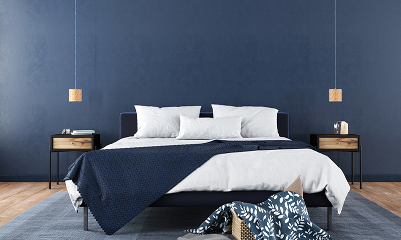 Navy bedroom with hanging lights