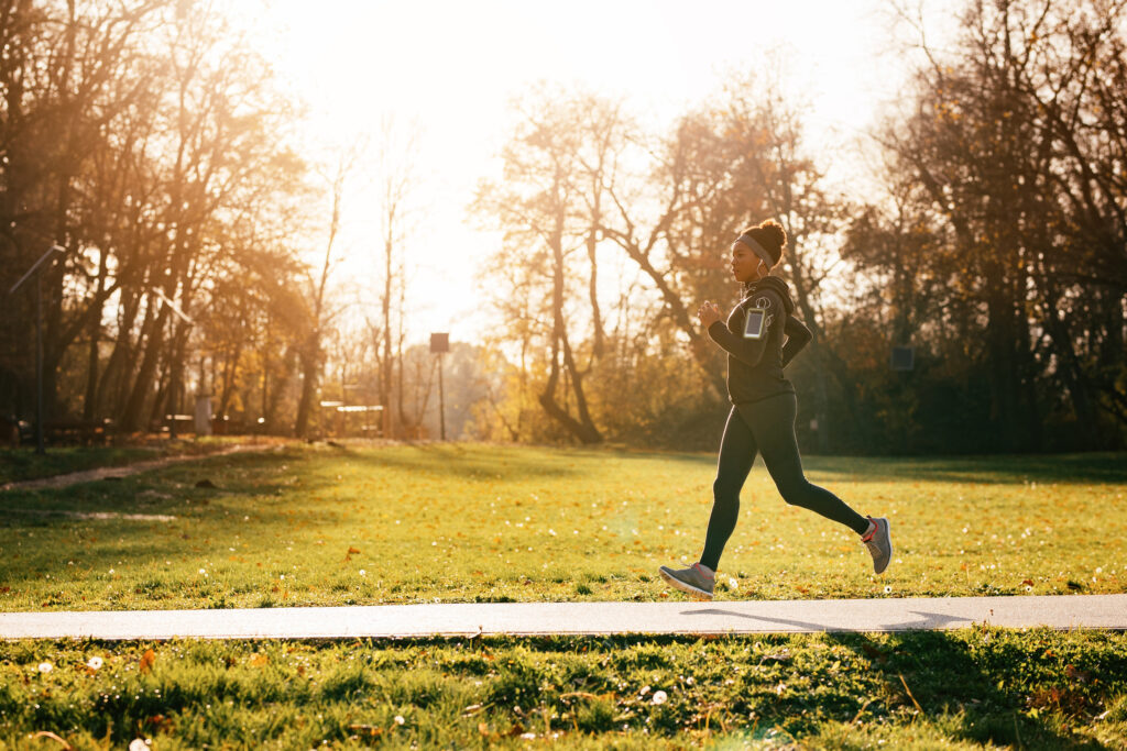 Young woman jogging at a park