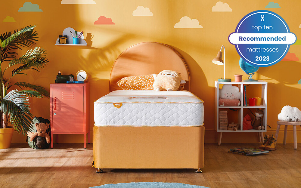 The Silentnight Healthy Growth Snooze Eco Mattress in an orange kids bedroom.