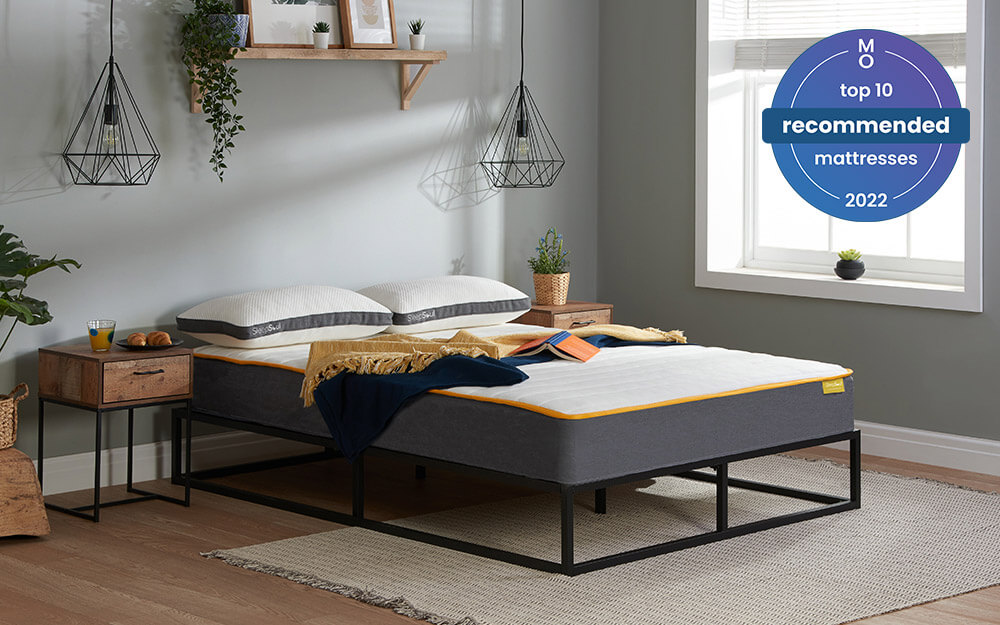 The SleepSoul Comfort 800 Pocket Mattress in a teenagers room on a metal bed frame.