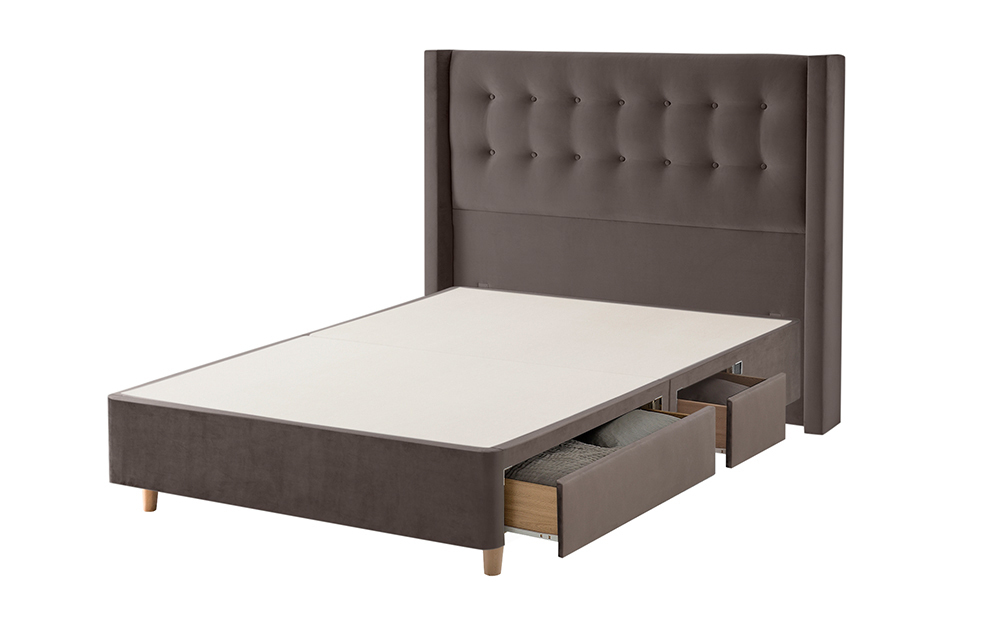 A sprung divan base with no mattress